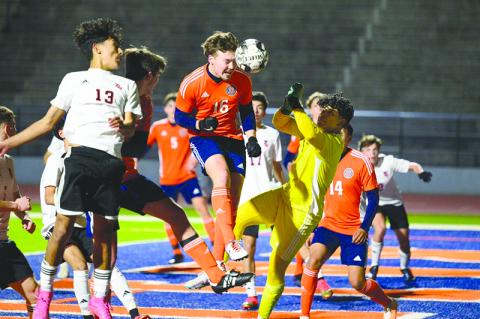 Habersham Central’s Brody Tyree lands the header for a Raiders goal during  Tuesday night’s season opener. ZACH TAYLOR/Special