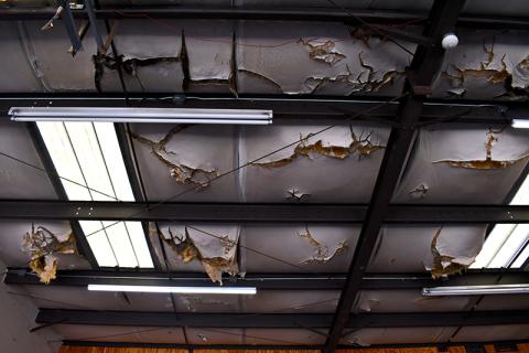Ceilings in the apparatus bay at  Station 12 on  Duncan Bridge Road are falling apart. This type of  disrepair is a scene  common to stations around the county. JULIANNE AKERS/Staff