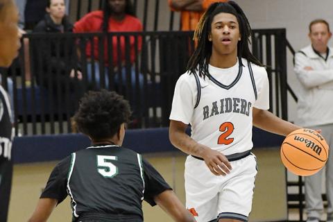 Habersham Central’s Enzo Combs looks to set up a play against Langston Hughes on Wednesday night. LANG STOREY/Staff