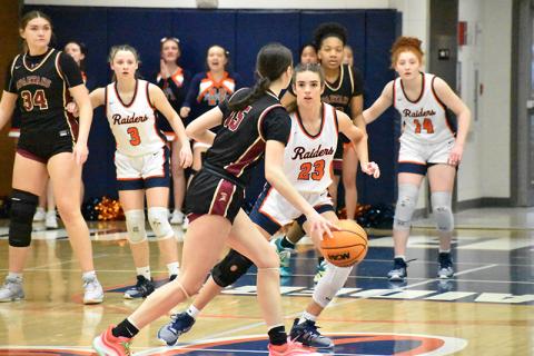 Habersham Central’s Kyia Barrett, Mackenzie Gosnell (3) and Daytona Underwood (14) are locked in on defense against South Paulding on Tuesday night. MATTHEW OSBORNE/Staff 