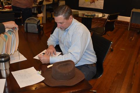 Habersham County Chairman Ty Akins signs paperwork Wednesday to run for the District 5 seat again. MATTHEW OSBORNE/Staff