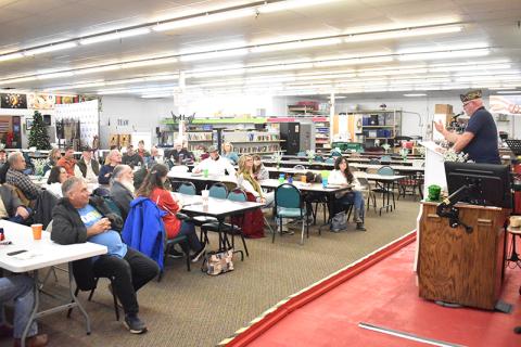 VFW Commander Bill Miles addresses the crowd at a town hall meeting Friday night in Cornelia. MATTHEW OSBORNE/Staff