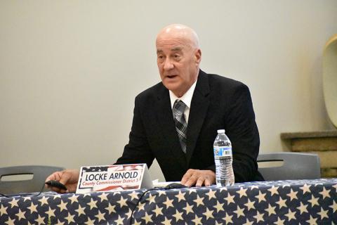 Locke Arnold speaks at the Farm Bureau political forum.