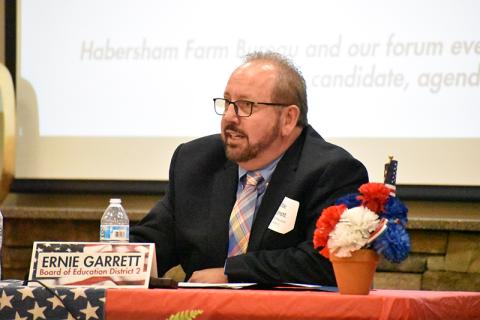 Ernie Garrett speaks at the Farm Bureau political forum.