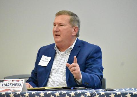 Bruce Harkness speaks at the Farm Bureau political forum.
