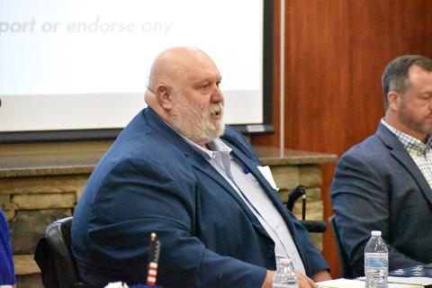 Bruce Palmer speaks at the Farm Bureau political forum.