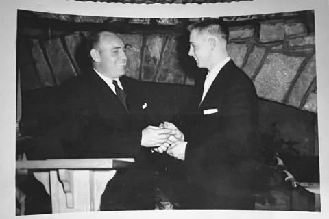 Coach Gene Alexander  hands Herman Benfield his All-Region award during a banquet  following the season. SUBMITTED