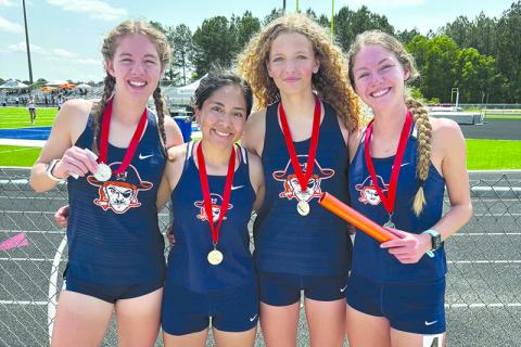 The Lady Raider 4x800 relay team of (from left) Abigail Hotard, Dulce Rojas, Ember Ivester and Audrey Hotard finished first Saturday. SUBMITTED