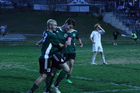 Freshman midfielder Kale Borchers receives a celebratory hug from his teammate Landon Hall after scoring his second goal in a win over Prince Avenue Christian in the first round of the GHSA Class A Division I State Playoffs. Borchers was one of two Indian players to record hat tricks in the match. GREG FINAN JR./Special