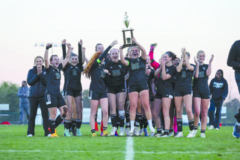 Tallulah Falls’ girls soccer team celebrates a region championship on Friday night. AUSTIN POFFENBERGER/Special