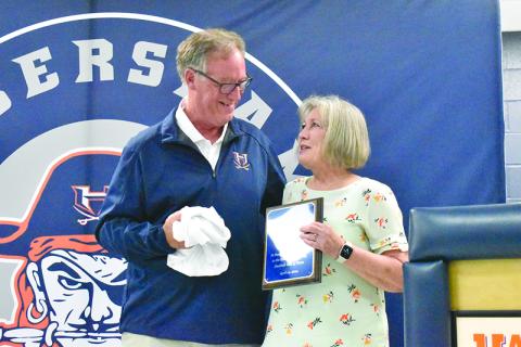 Habersham Central Athletic Director Geep Cunningham got emotional while inducting his longtime colleague Terri Roberts on Wednesday night. MATTHEW OSBORNE/Staff