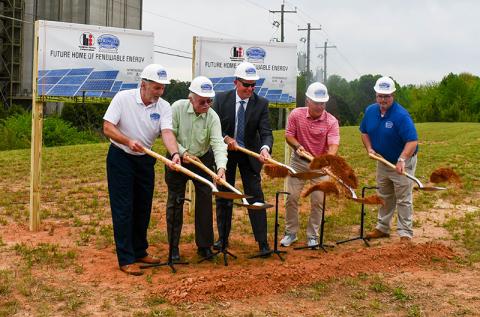 From left, Fieldale Executive Vice President of Sales and Marketing Jeff Paschall, Fieldale President Tom Hensley, Georgia Power Region Director Tony Ferguson, Fieldale Executive Vice President of Operations John Wright and Fieldale Environmental Manager Alex Sullivan break ground at the site of the future solar farm. JULIANNE AKERS/Staff