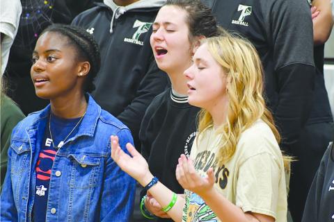 Kaylin Pickett, Caroline Smith and Lily Turpin rejoice at last year’s Fields of Faith at Tallulah Falls School. FILE