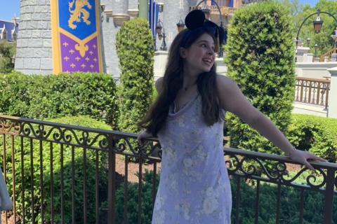 Lilly Kate Farrar stands in front of Cinderella’s castle in Disney World during Disney Dreamers Academy. SUBMITTED
