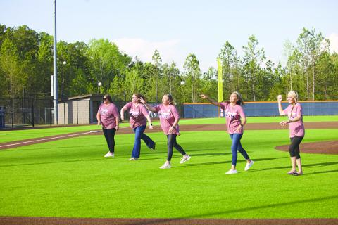 Habersham Central baseball’s senior moms throw out the first pitch Monday night, including (from left) Brandi Burrell, Stacey Gailey, April Bass, Amber Chastain and Kelly Gunn. KYIA BARRETT/Special