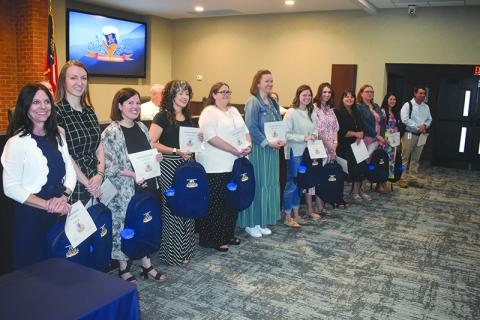 The Board of Education honored the 2024 graduates of the Leadership Academy on Monday night. Shown are (from left) Pam Threlkeld, Claire Steverson, Keylia Patton, Gisela McGugan, Dora Lucas, April LaHayne, Melanie Jackson, Ashley Ivester, Kristy Hallford, Stacey Gailey, Lauren Fair and Ben Bolton. MATTHEW OSBORNE/Staff