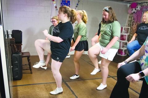 From left, Delaney Shirah leads clogging class in Cornelia with Emma  Grace McDuffie, Regan George and AnnaReese George. ZACH TAYLOR/Special