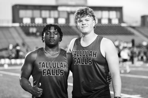 Tallulah Falls track athletes Ade Akisanya (left) and Sam Ketch take a minute to reflect during the state meet. SCOTT NEAL/Submitted