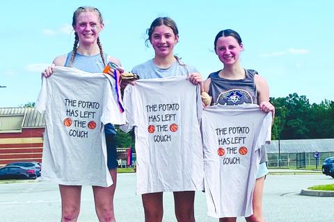 Top 3 finishers (from left) Tessa Murdock, Sadie Chambers and Mackenzie Gosnell show off their 5K T-shirts. SUBMITTED