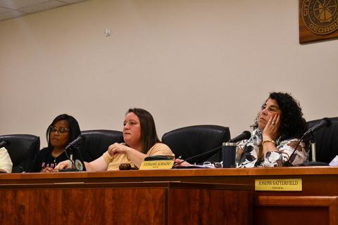 Baldwin Councilwoman Alice Venter speaks at Monday's meeting as Councilwoman Kerri Davis (left) and Mayor Stephanie Almagno listen.