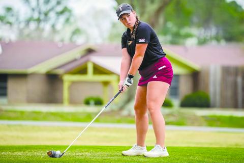 Troy golfer Brinson Hall lines up her drive during a match earlier this year. TROY ATHLETICS/Submitted 