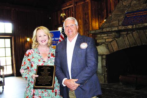  Lisa Smith is given the Robert S. Stubbs Guardian of Ethics Award by Habersham Rotary Club President Bradley Cook. BRIAN WELLMEIER/Special