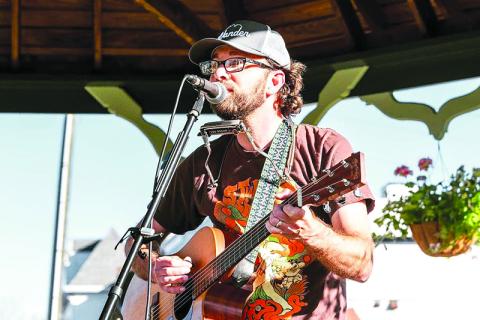 Bryant Tench plays for folks at the Clarkesville gazebo during a recent concert. SUBMITTED