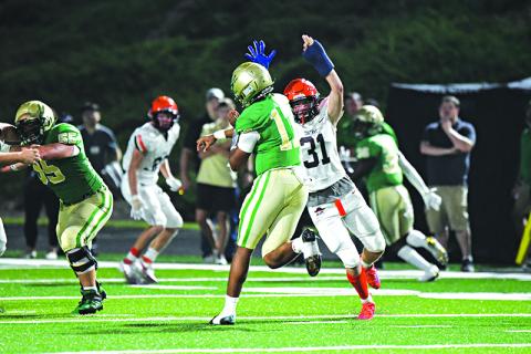 Habersham Central’s Braydon Wright rushes the quarterback against Buford in 2021. FILE