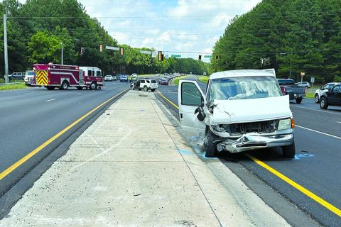A church van rests in the northbound turn lane from Highway 365 to Demorest-Mt. Airy Highway following Saturday afternoon’s wreck. HABERSHAM COUNTY/ Submitted