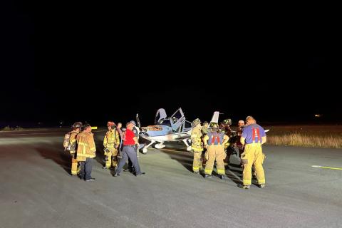 Emergency personnel from Habersham County, Cornelia, and Baldwin discuss their response to Thursday night’s emergency landing. SUBMITTED 