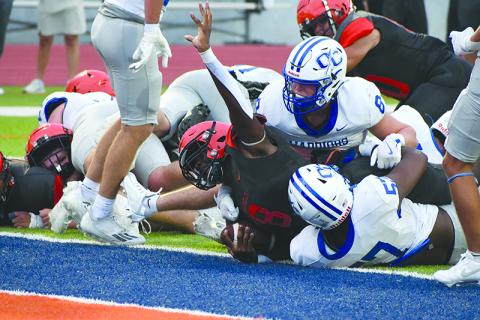 Habersham Central’s Antonio Cantrell plows his way into the end zone for a touchdown on Friday night against Oconee County. LANG STOREY/Staff