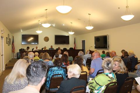 Residents pack Clarkesville City Hall as planning commission considers annexation, rezoning. BRIAN WELLMEIER/Staff