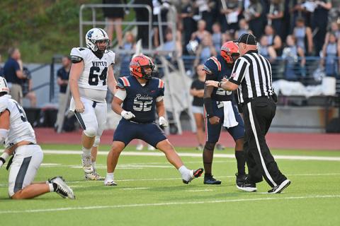 Anthony Garrido (No. 52) celebrates a big defensive play against White County last week. TOM ASKEW/Special