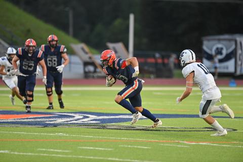 Everett Rudeseal darts upfield after a catch last week. TOM ASKEW/Special