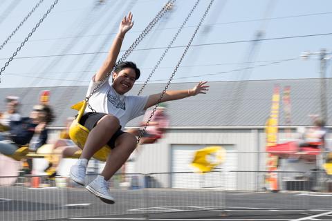 Lucky Tiamtisack goes round and round on the swings with his arms raised in the air. The special education day at the Chattahoochee Mountain Fair is an annual tradition in Habersham County. ZACH TAYLOR/Staff