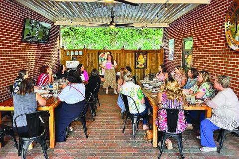 Marcia Hamil leads a discussion at a recent Habersham Professional Women meeting. SUBMITTED