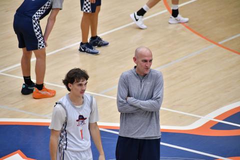 Raider’s guard Caden Garrison (left) and Coach Tommy Yancey crack a joke during practice earlier this week. LANG STOREY/Staff