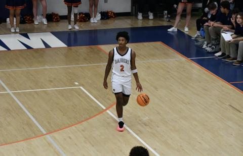 Enzo Combs surveys the floor during the first half of Habersham’s win over White County Tuesday. LANG STOREY/Staff