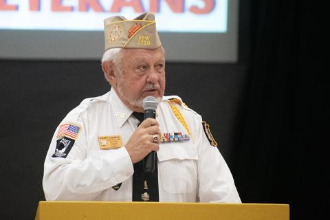 Grant-Reeves VFW Post 7720 Commander Barry Church spoke to veterans and students at Monday morning’s program. JULIANNE AKERS/Staff