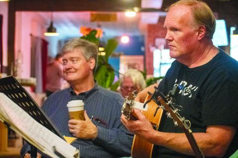 Jimmy Maness and Stan Crump share a laugh while Crump sings “Oh, Pretty Woman” by Roy Orbison. JULIANNE AKERS/Staff