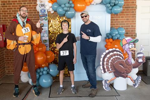 The winner of this year’s Turkey Trot, Jackson Weeks, finished with a time of 20:54, an impressive feat for the youngster battling the hilly route. Weeks stands in between Zach Staggs and Pastor Nathan LaShoto in this photo. ZACH TAYLOR/Staff