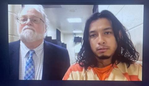 Angel DeJesus Rivera-Sanchez (right) appears with Public Defender Drew Powell in Habersham County Magistrate Court on Nov. 1 in this video screenshot. 