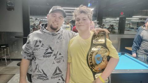 Colston Harrelson (right) and his father Bradley snap a photo after Colston’s big win this past weekend in Alabama. SUBMITTED