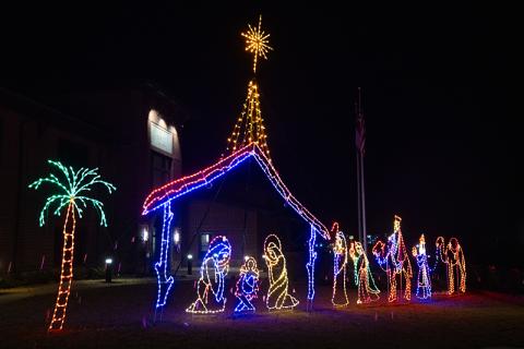 An illuminated manger scene sits outside of Cornelia City Hall. ZACH TAYLOR/Staff