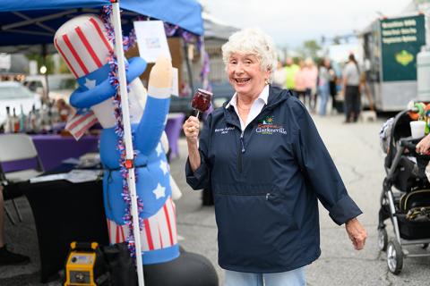 Clarkesville Mayor Barrie Aycock will not run for another term as mayor in the next election. Franklin Brown was named Mayor Pro-tem at the Jan. 6 meeting. Pictured here, Mayor Aycock holds a candy apple while donning an ‘Experience Clarkesville’ windbreaker. ZACH TAYLOR/Staff 