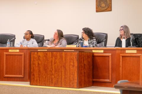 Mayor Stephanie Almagno and Councilwomen Kerri Davis, Alice Venter and Nancy Lehman listen intently to Baldwin Resident Paul Wolf about his garbage disposal issues. ZACH TAYLOR/Staff