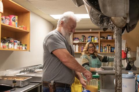 Married duo Bill and LeeAnn Waller prepare food and drinks on an early Saturday morning before guests arrive at the Cornelia “Lord’s Help” Soup Kitchen. HANNAH CAUDELL/Staff