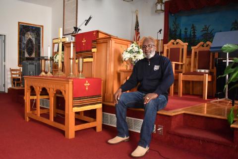 Bishop Ernest Burns sits in the sanctuary of Shady Grove Baptist Church in Cornelia. As the church looks for a new pastor, he continues to preach on Sundays. Samantha Sinclair/Staff
