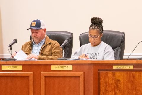 Councilman Erik Keith and Councilwoman Kerri Davis review paperwork in the Monday Baldwin meeting. ZACH TAYLOR/Staff 