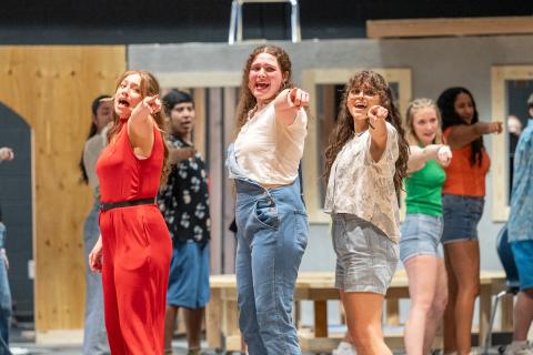 From left, Annalee Lewis, Abigail Taylor, and Ary Sanchez point toward the audience during one of their practice performances for Thursday’s opening night. “Mamma Mia!” will take the Habersham Central High School stage on Friday. The show will run through Sunday with a matinee show at 2 p.m. on the final day. The two-and-a-half hour show is filled with great vocals and choreography, with some funny moments mixed in. ZACH TAYLOR/Staff 